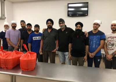 LOP volunteers from Central Sikh Gurdwara cook, pack and deliver meals to the needy in Singapore.